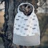 abero de mesa infantil con estampado de animales del bosque, gofre beige y cuello elástico.
