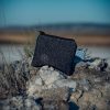 Monedero de tela confeccionado con patchwork y puntadas de Boro cosidas a mano.