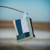 Monedero de tela confeccionado con patchwork y puntadas de Boro cosidas a mano.
