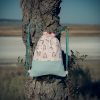 Mochila infantil pequeña de tela con estampado de unicornios hecha a mano.