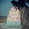 Mochila infantil pequeña de tela con estampado de unicornios hecha a mano.