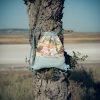 Mochila infantil pequeña de tela con estampado de animales del bosque hecha a mano.