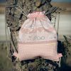 Mochila infantil pequeña de tela con estampado de conejitos dulces hecha a mano.
