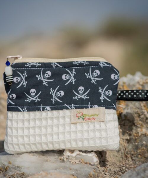Pequeño monedero en tela de algodón con tela estampada de piratas blanco y negro